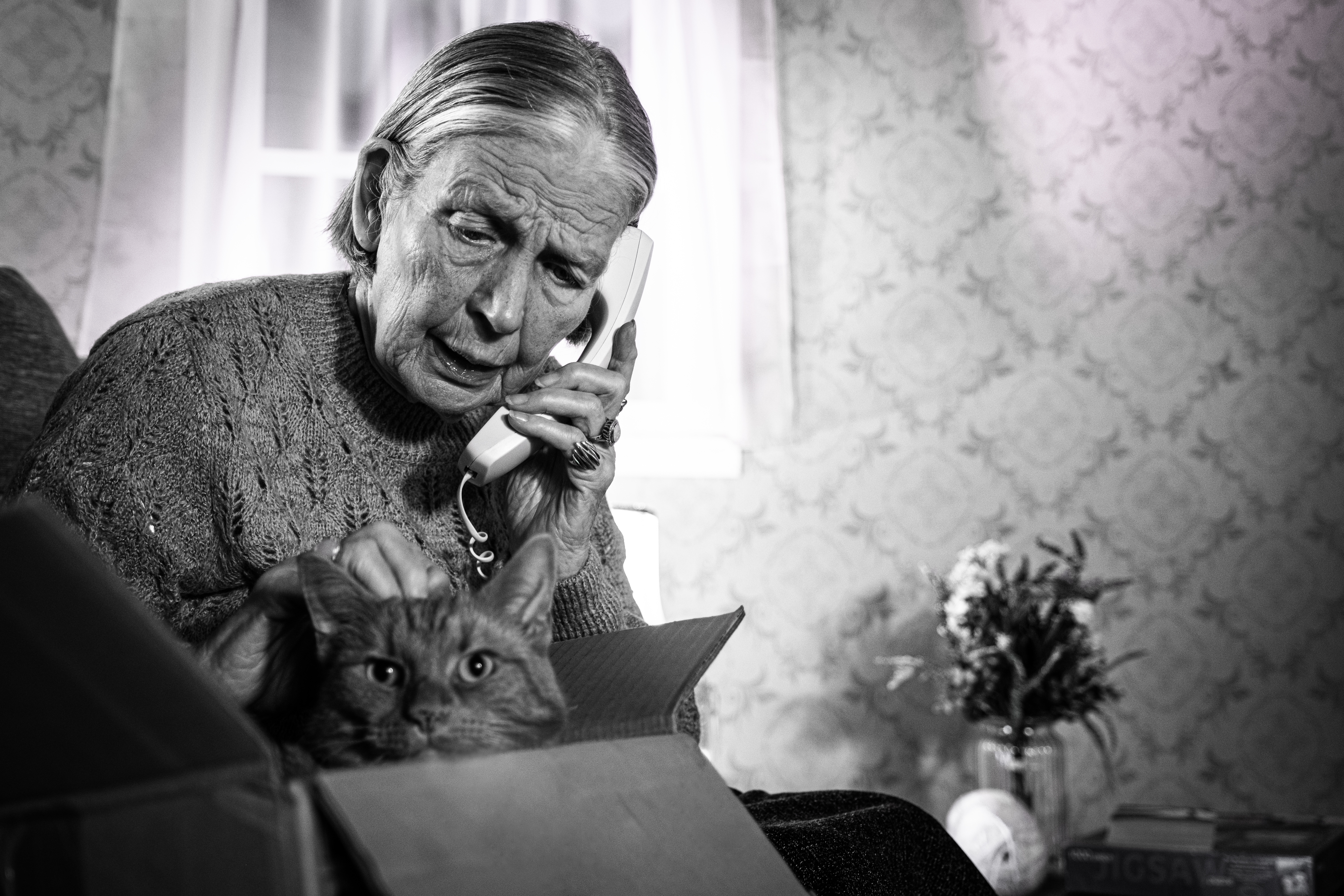 old woman and cat